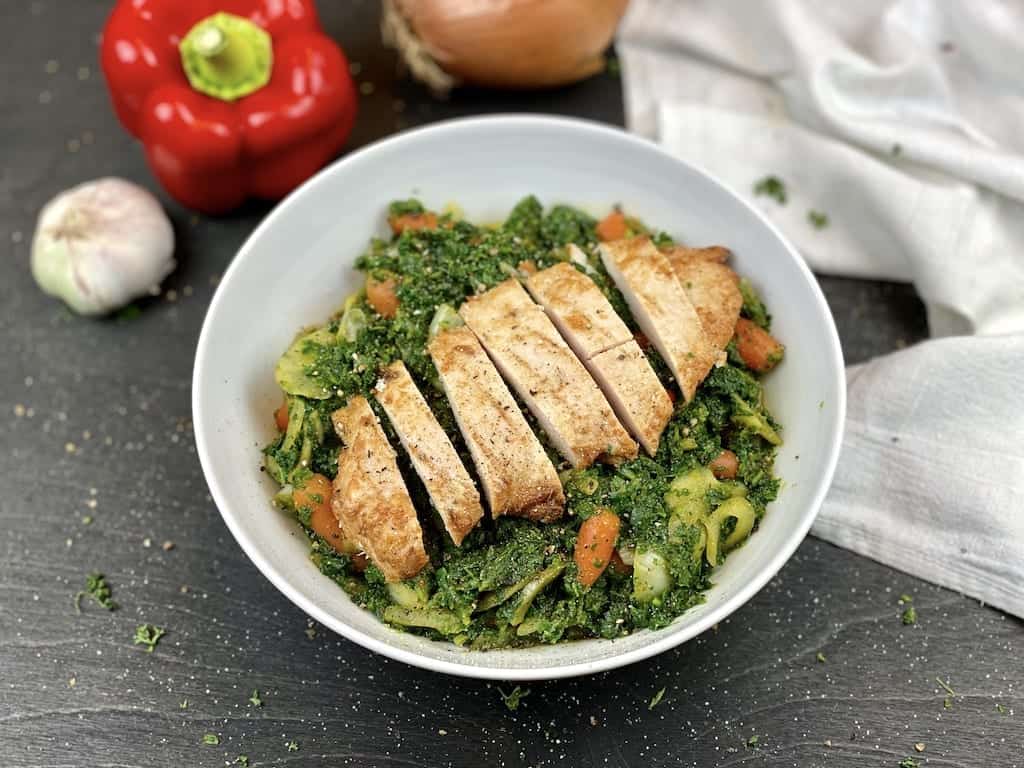 Citrus chicken on spinach